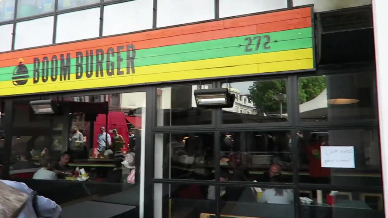 Boom Burger shopfront with red, yellow and green signage on Portobello Road
