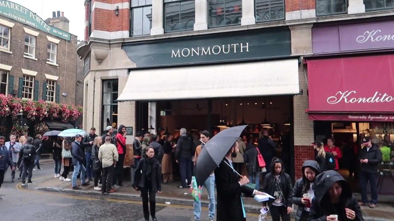 Monmouth Coffee shopfront and queue at Borough Market