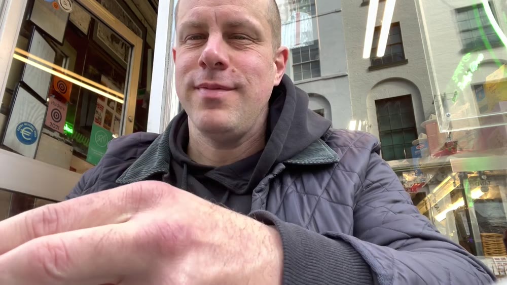 Roberts London having breakfast outside Bar Italia on Frith Street