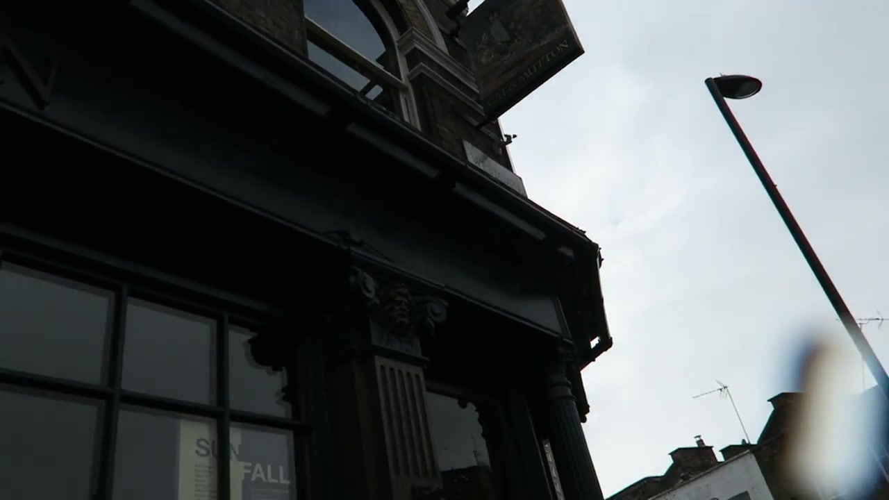 The Cat and Mutton hanging sign above its dark painted frontage in 2016