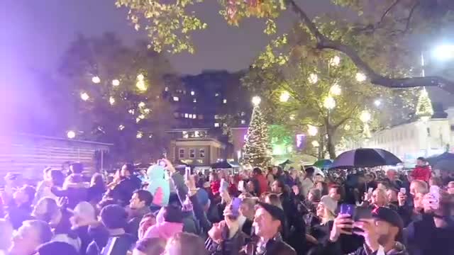 Crowds beneath illuminated trees at Duke of York Square during the 2016 Christmas party