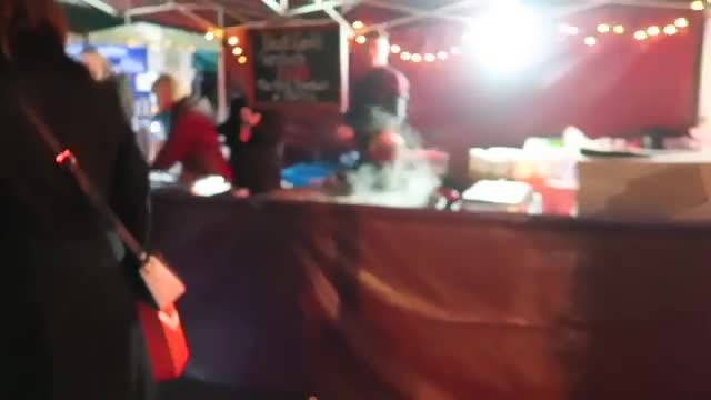 Partridges market stall with red canopy at Duke of York Square in 2016