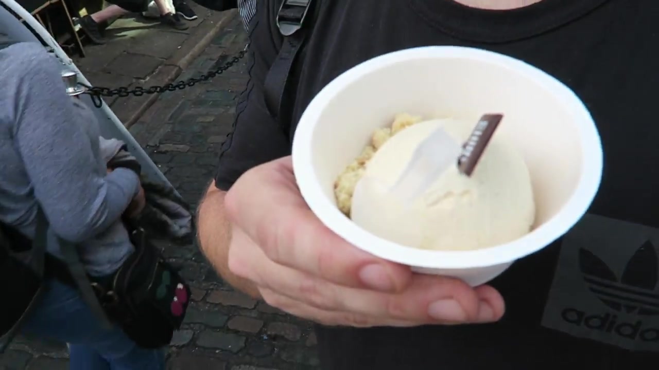 Cup of vanilla ice cream held outside Chin Chin Labs in Camden Market