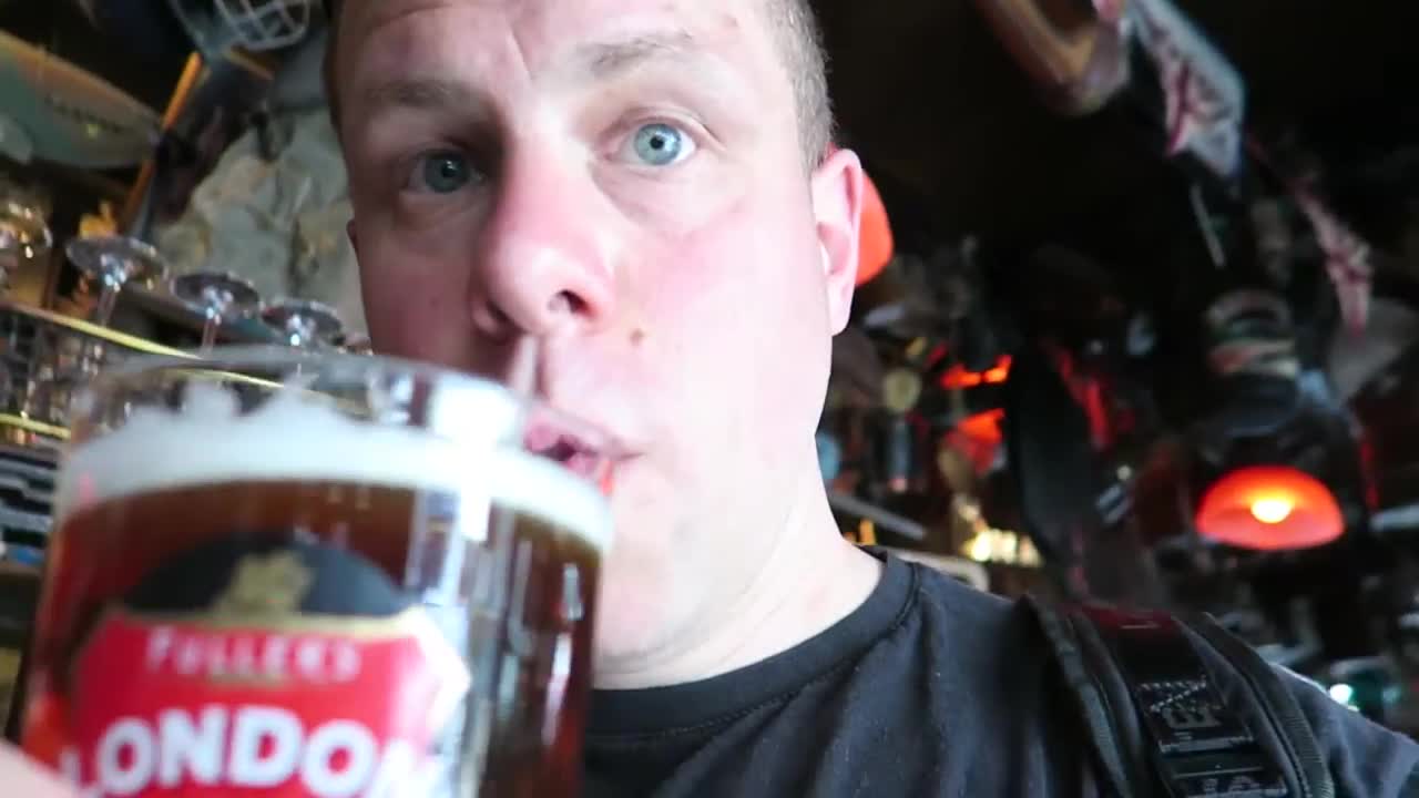 Barry Roberts holding a pint in a Fullers London Pride glass
