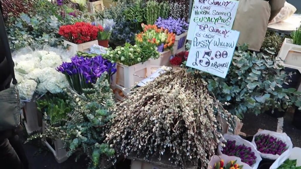 Colourful cut flowers and foliage at the market stalls.