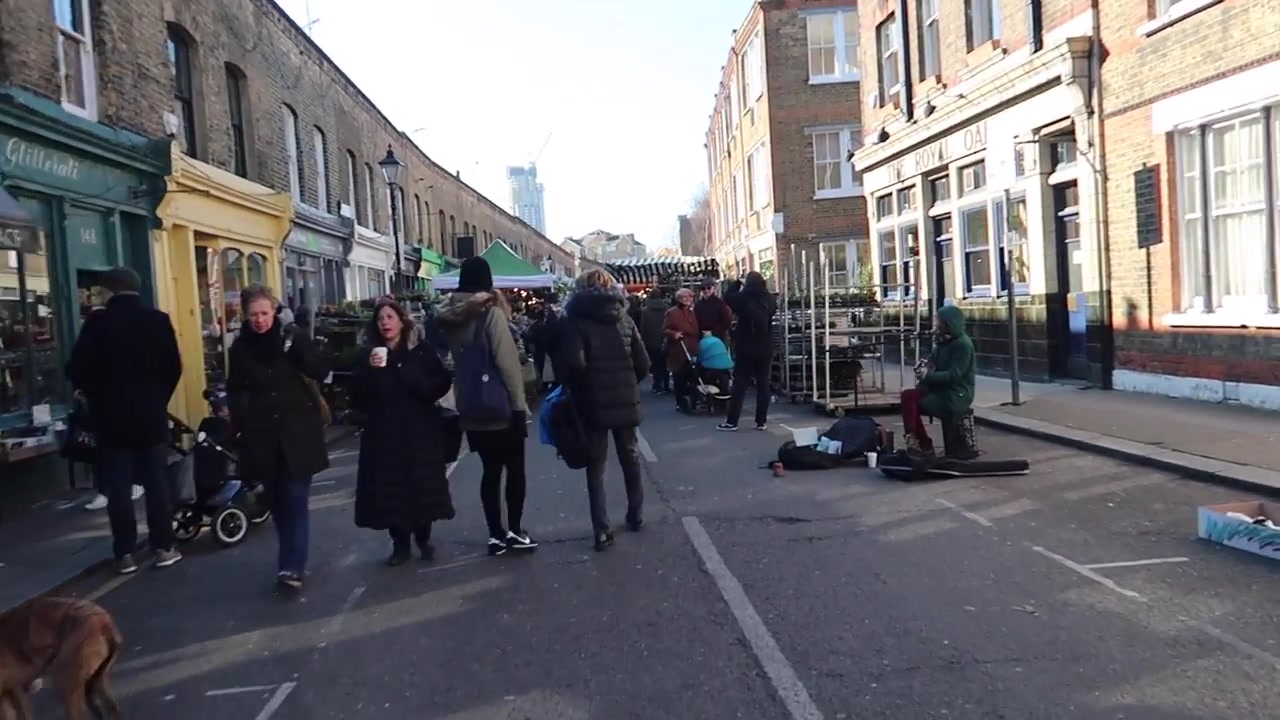 Walking towards the flower stalls on Columbia Road.