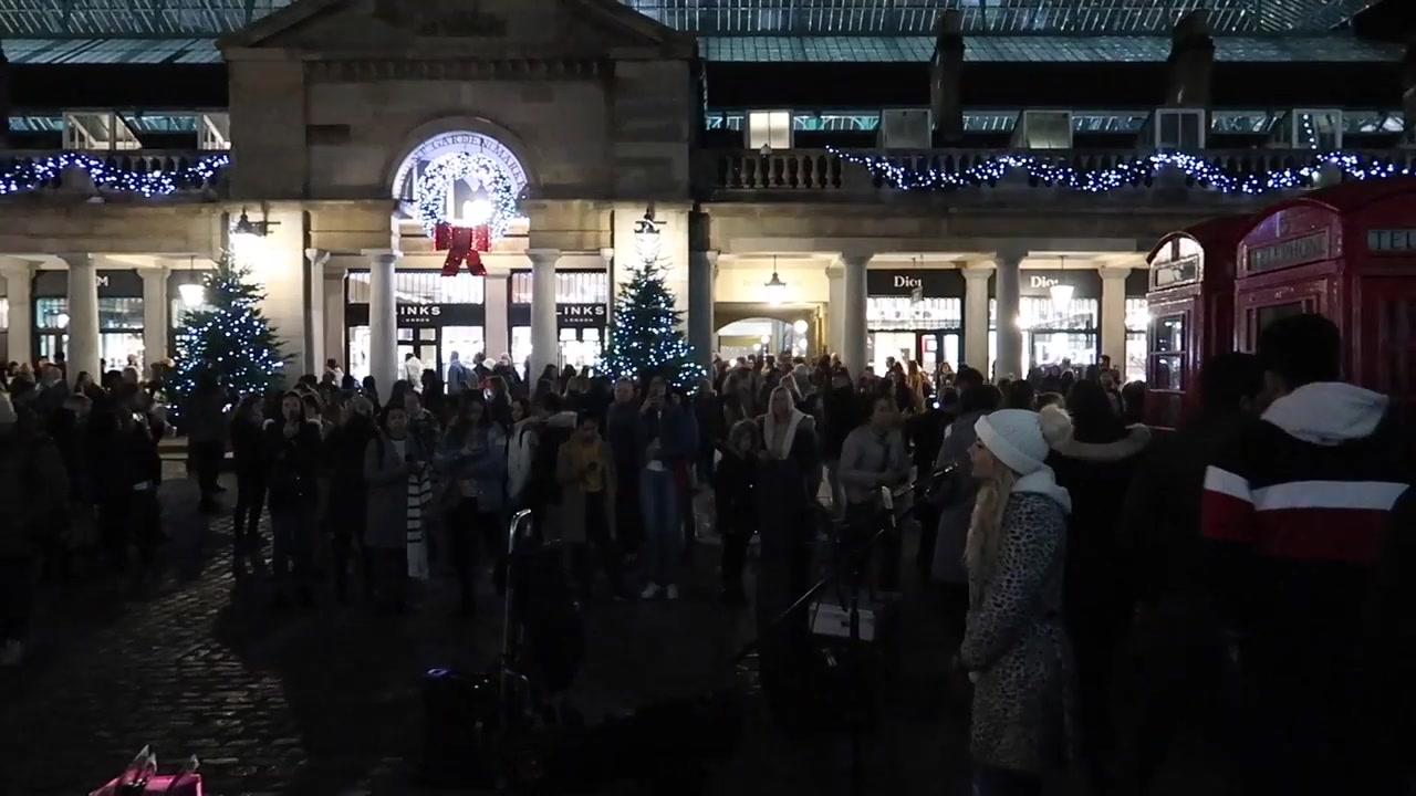 Christmas garlands and crowds outside Covent Garden Market Building in 2018