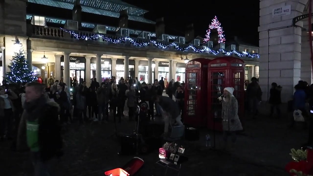 Covent Garden Market Building garlands with red telephone boxes in front