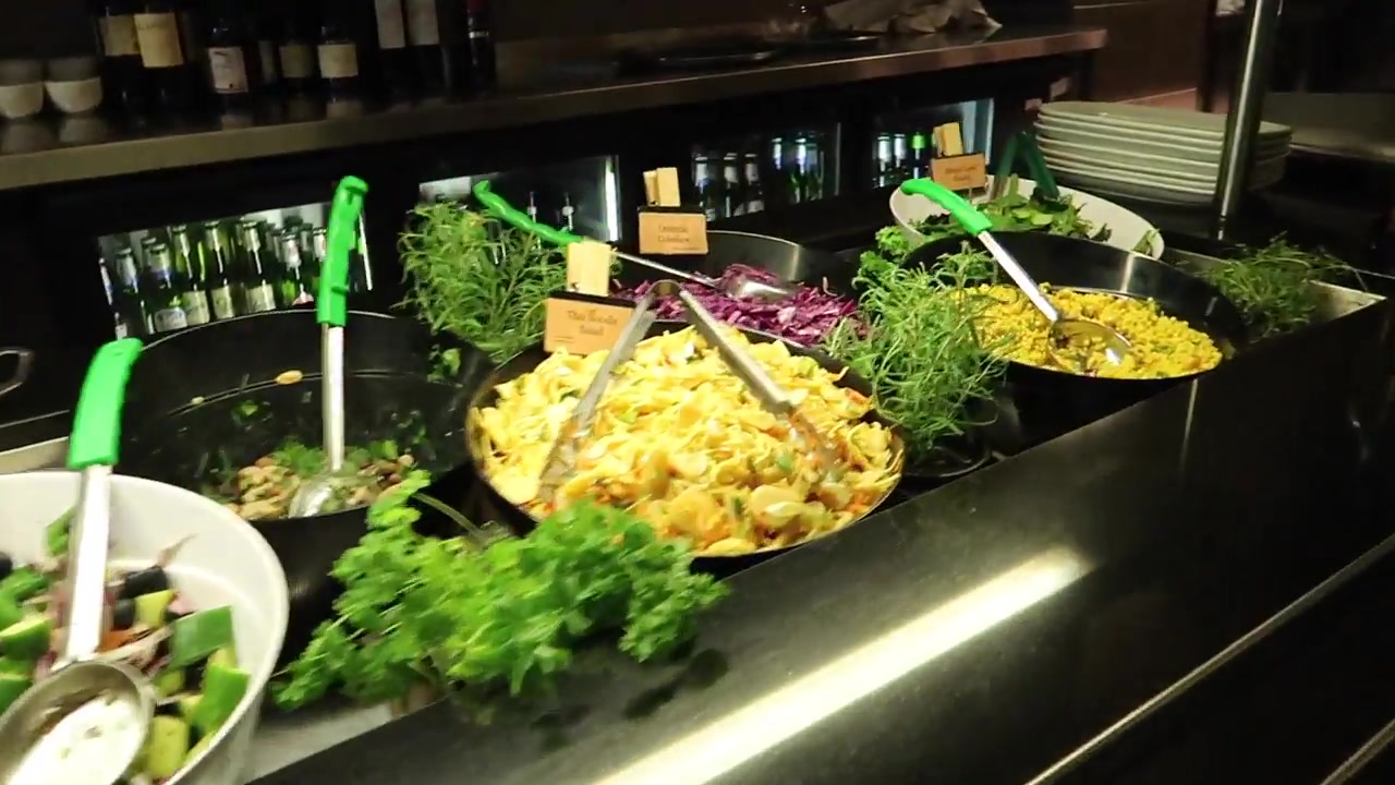 Salads and other dishes on the café food counter.