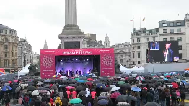 Diwali London 2016 stage beneath Nelson’s Column with umbrellas filling Trafalgar Square