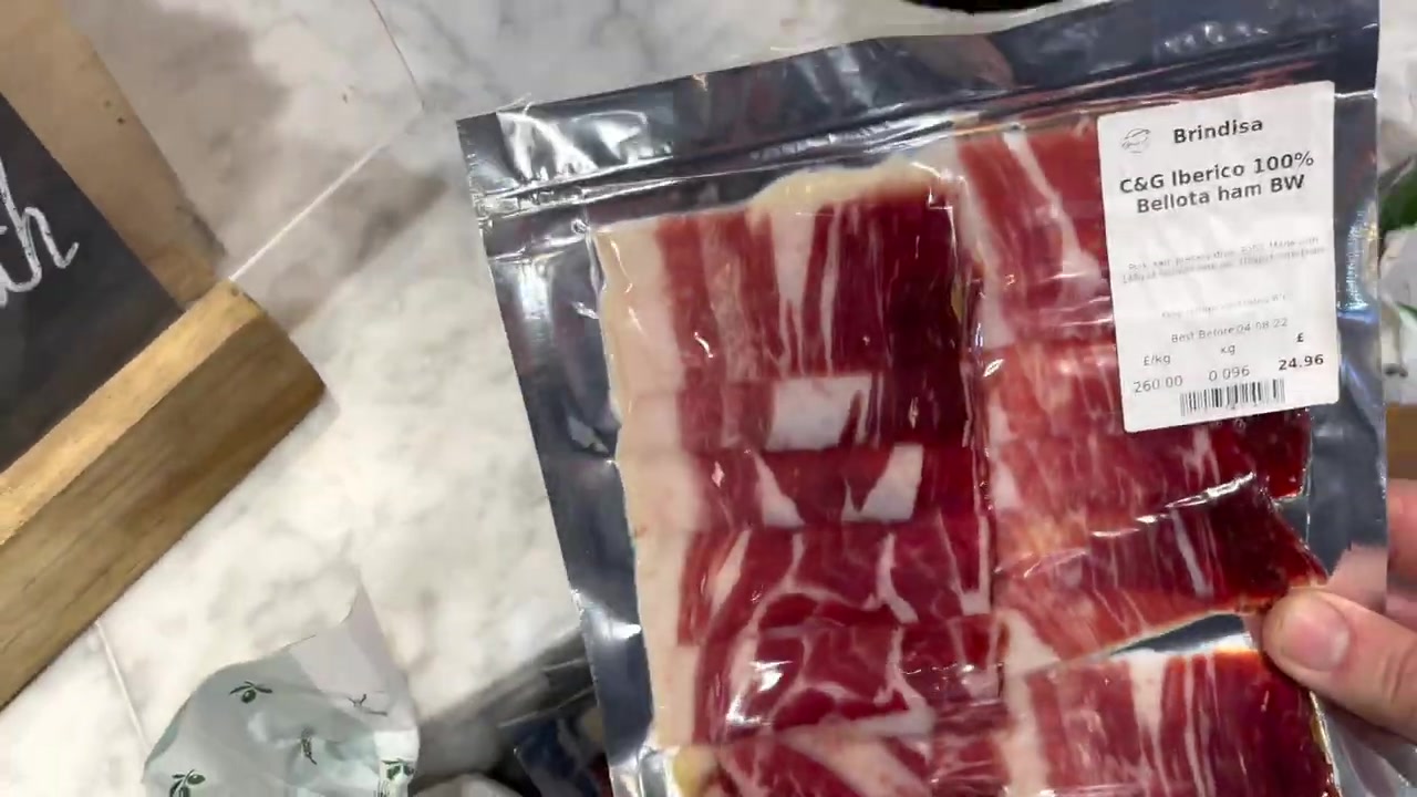 Barry Roberts tasting cheese, wine and market produce at home in 2022