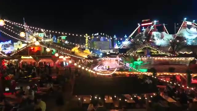 Wide night view across Hyde Park Winter Wonderland in 2016