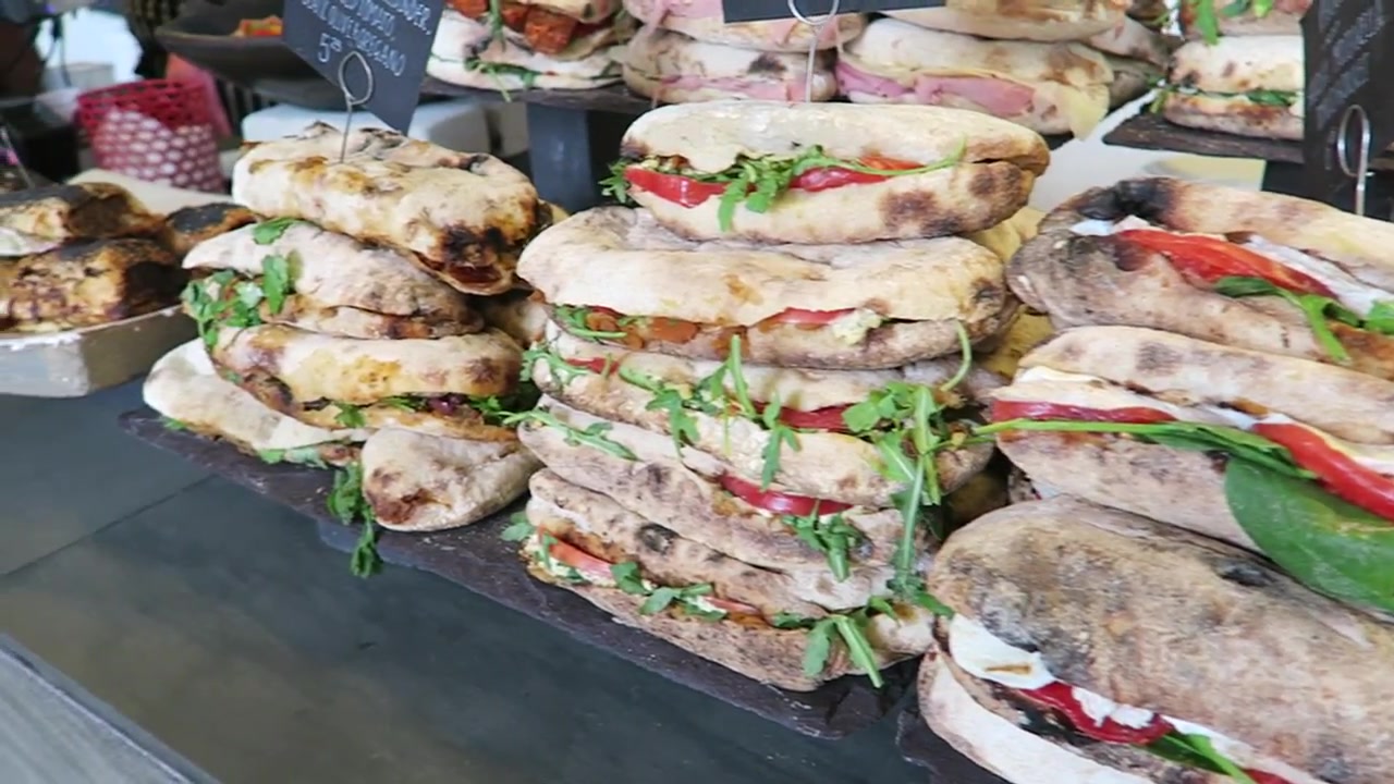 Stacks of filled sandwiches on the Fernandez and Wells counter at Somerset House