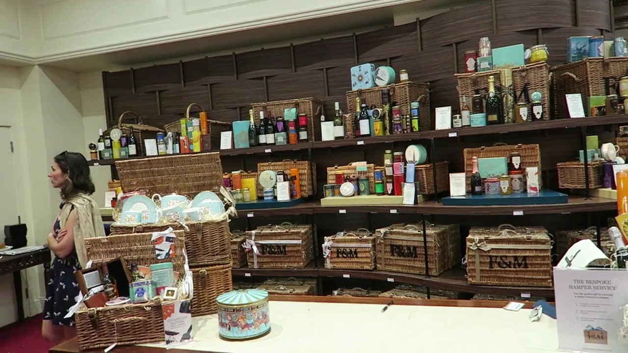 Wicker picnic hampers and provisions inside Fortnum and Mason