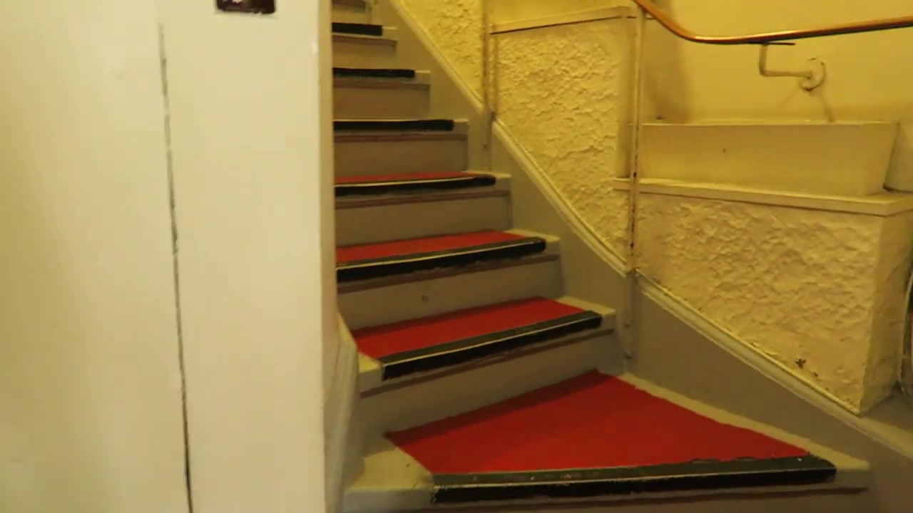 Painted staircase and banister inside the India Club building