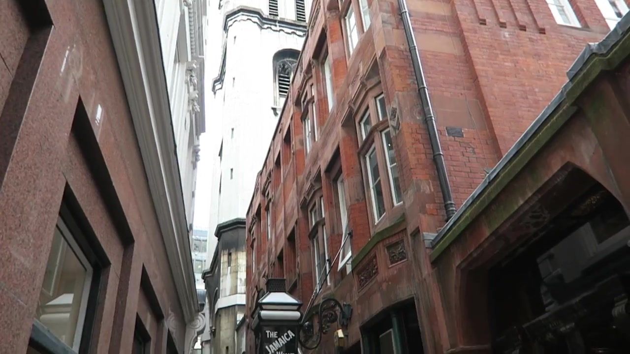 Jamaica Wine House brick frontage and hanging sign in the narrow St Michael’s Alley