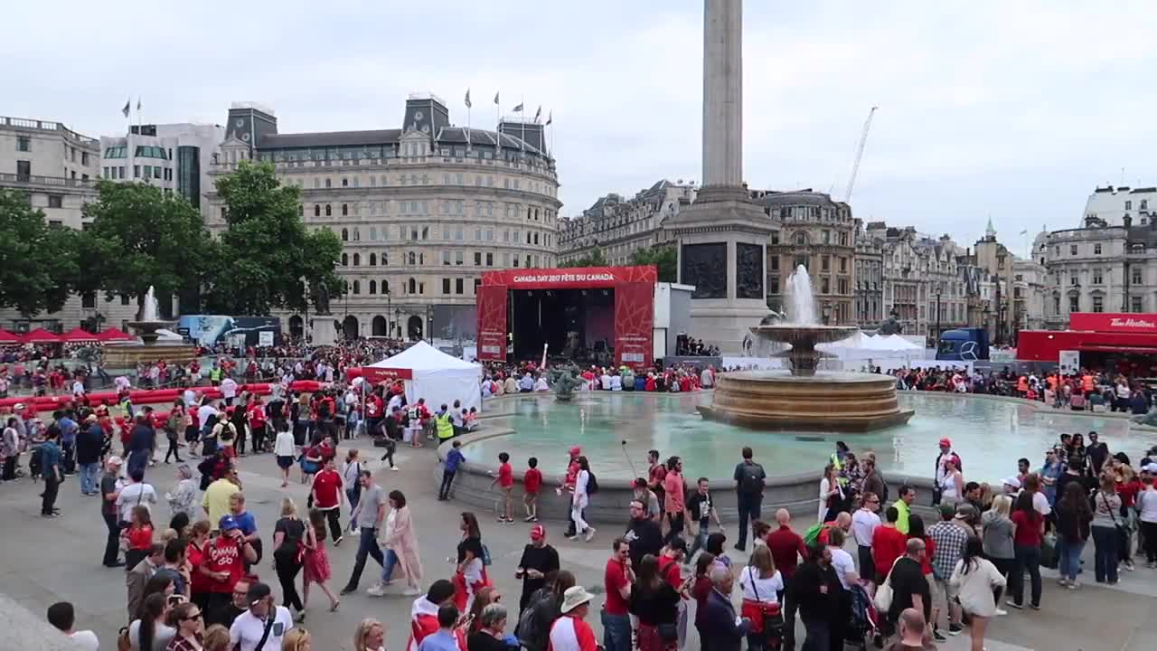Canada Day crowds and stage around the Trafalgar Square fountains