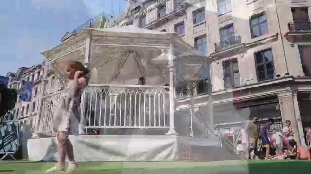 A performer on a raised platform during Regent Street Summer Streets in July 2018