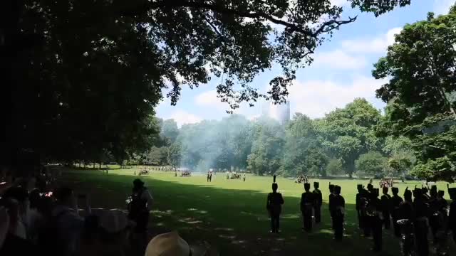 Smoke drifting across Green Park during the gun salute