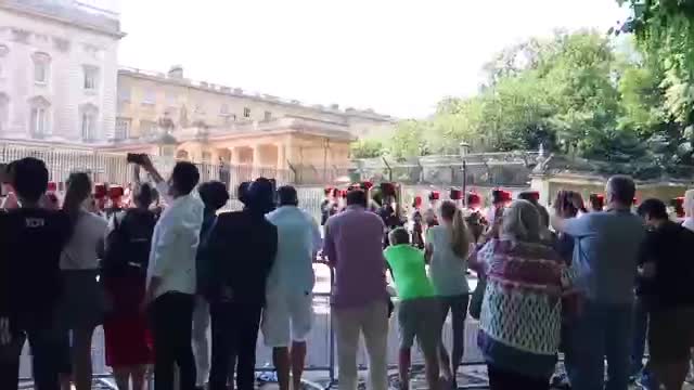 Mounted ceremonial procession near Buckingham Palace