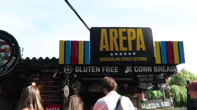 Arepa sign above the Arepazo Bros street food stall at Camden Market