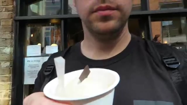 Barry holding a cup of Chin Chin ice cream outside the Camden shop
