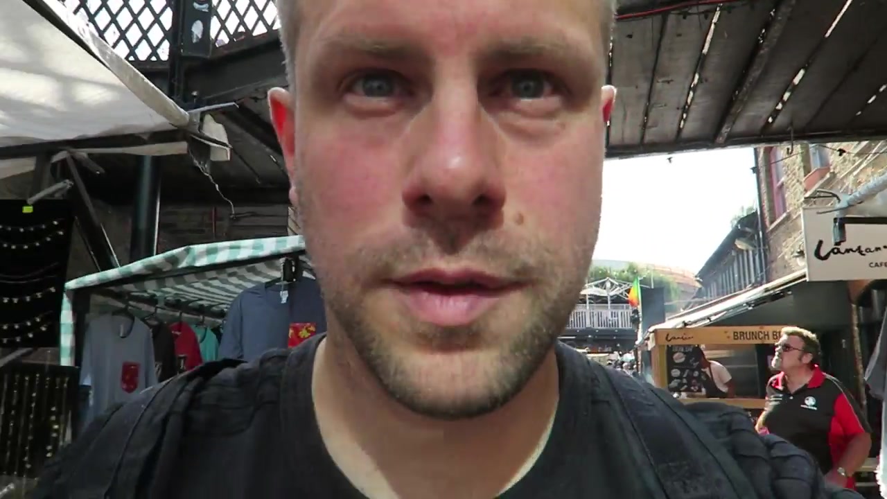 Barry in Camden Market with the Lantana sign and brunch stall behind him