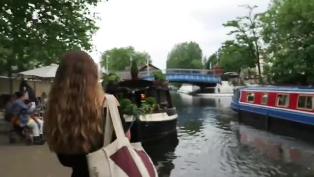 Canal boats and a blue bridge at Little Venice in London