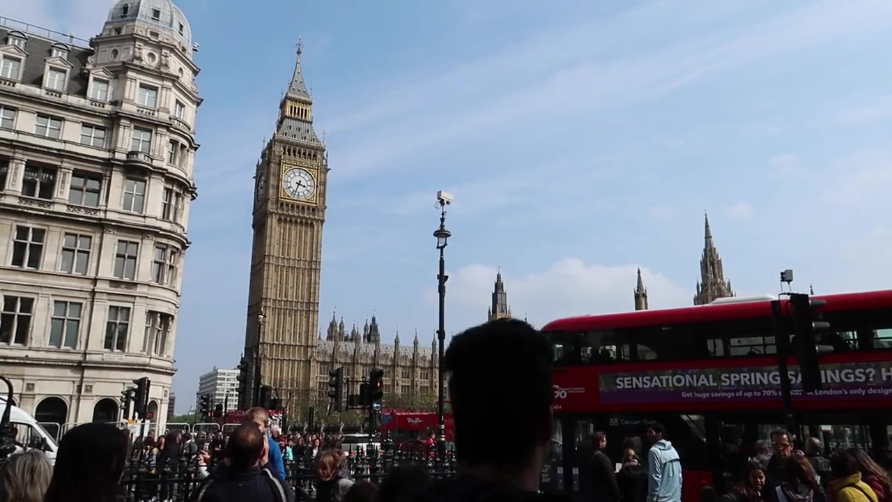 Elizabeth Tower, the Houses of Parliament and a red London bus