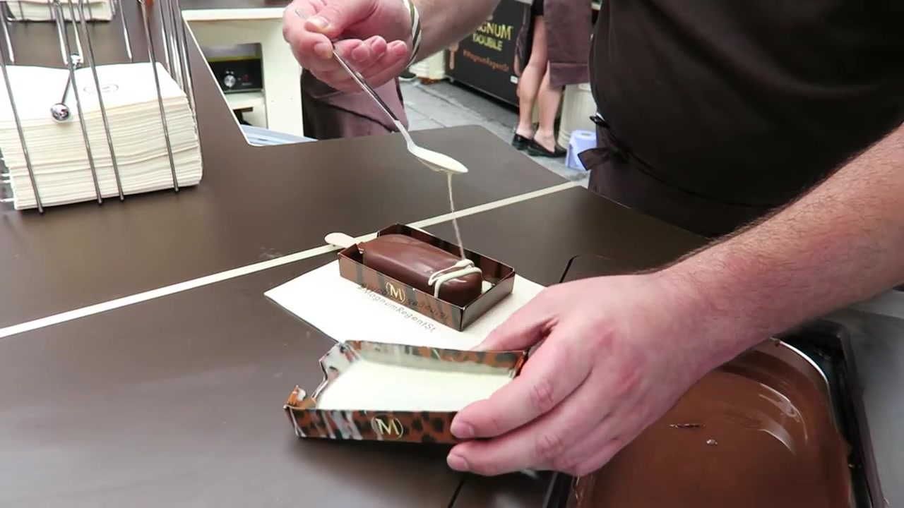 White chocolate drizzled over a dark chocolate Magnum