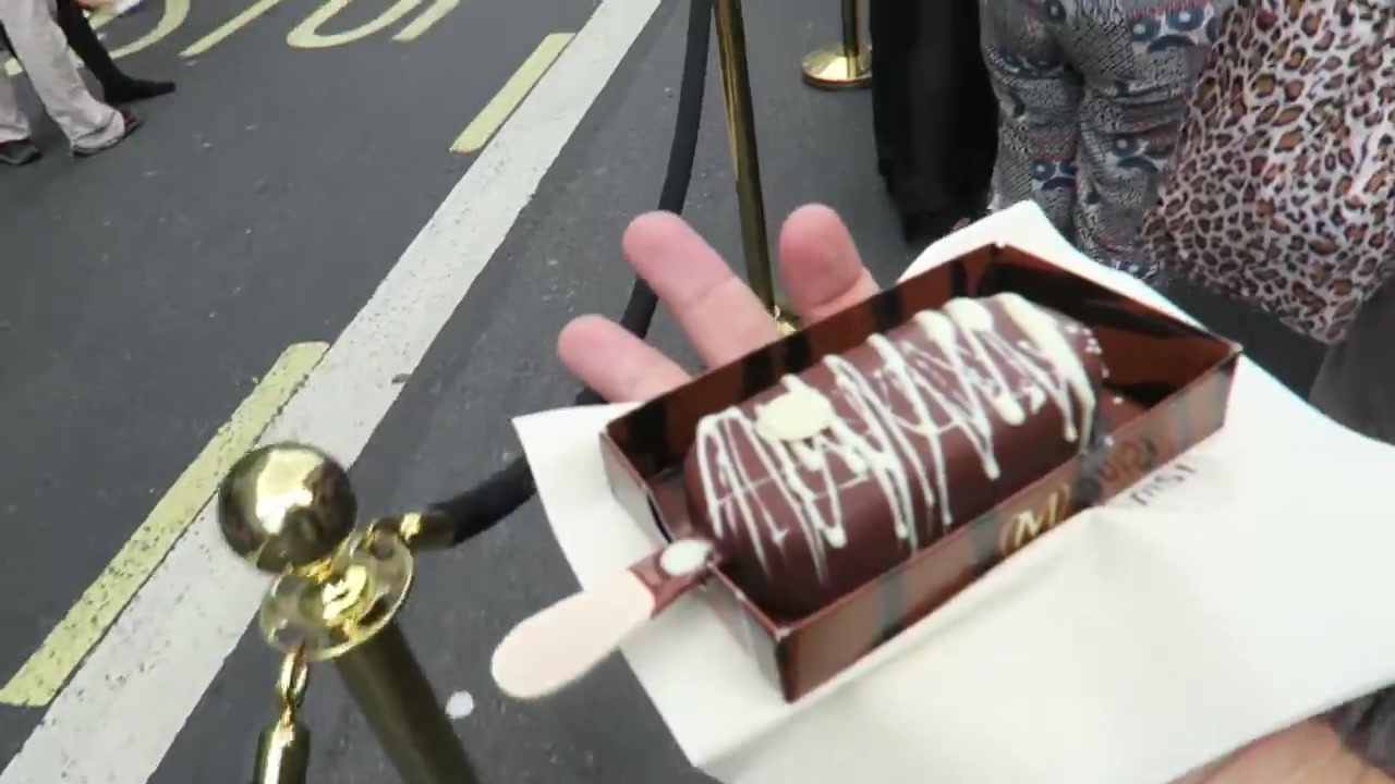 Finished hand-dipped Magnum with white drizzle on Regent Street