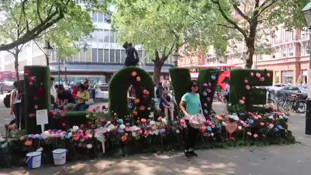 Flower displays brighten the shops during the Chelsea visit.