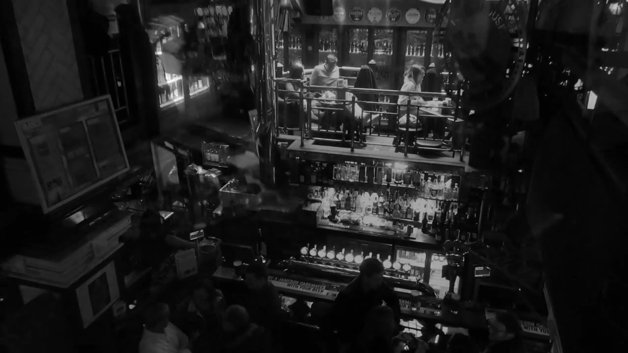 The Porterhouse interior in the film’s black-and-white pub sequence.