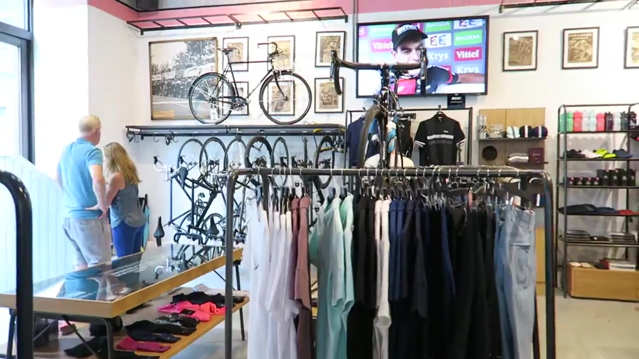 Cycling clothing, framed photographs and bicycles inside Rapha Cycle Club London