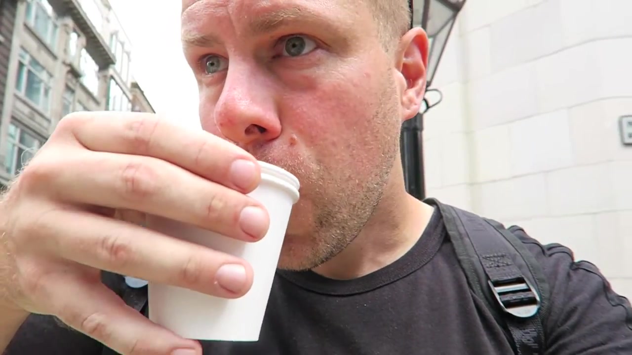 Barry Roberts drinking a takeaway Americano outside Rapha in London