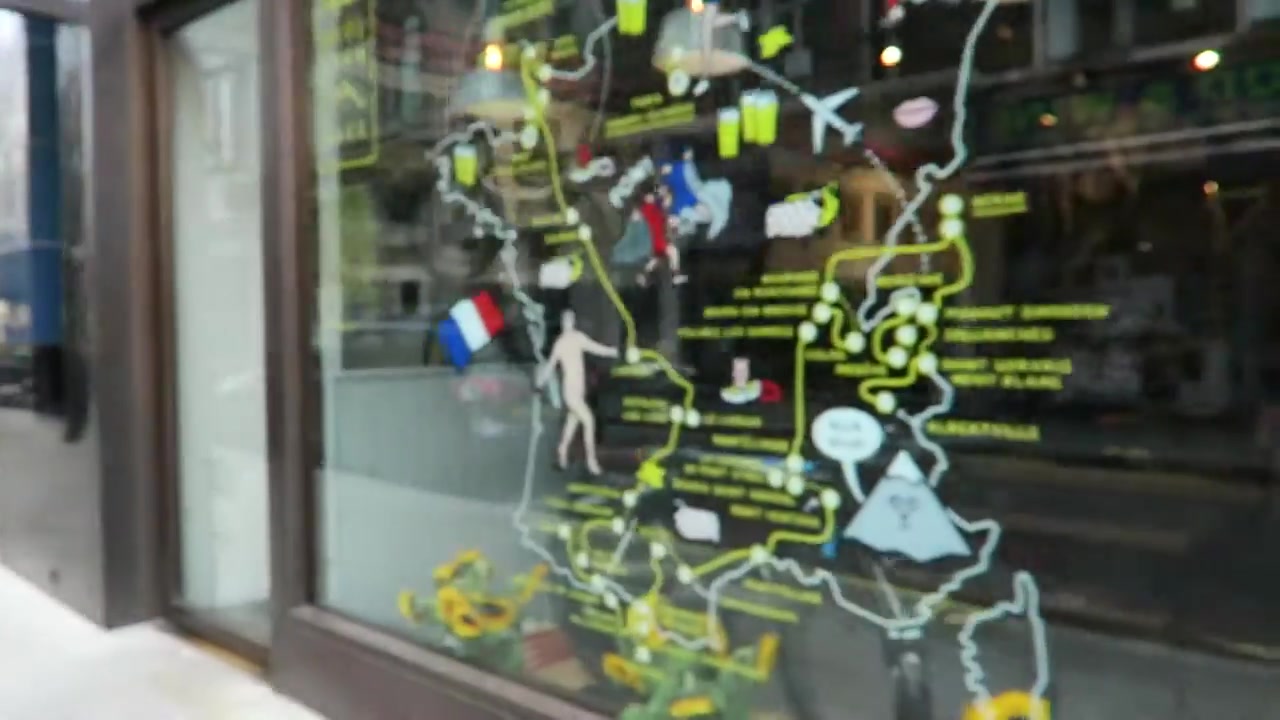 Tour de France route illustration on the Rapha shop window in 2016