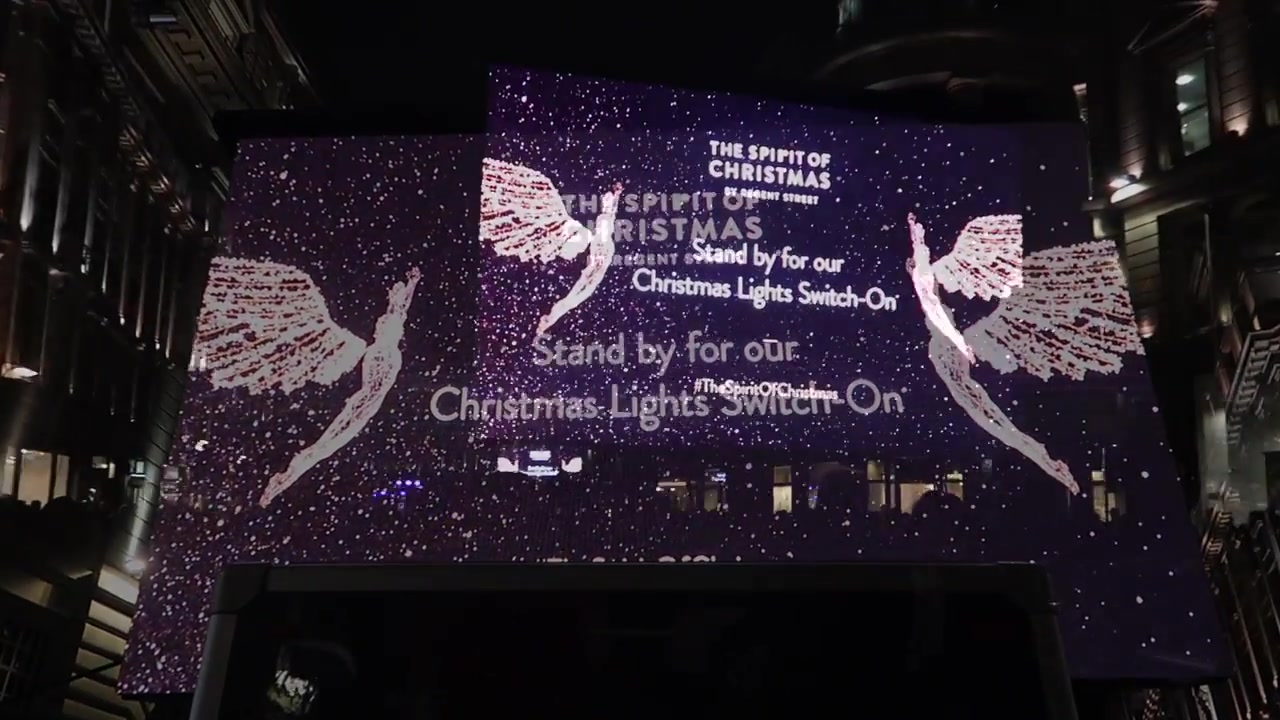 The Spirit of Christmas screen above the event stage on Regent Street.