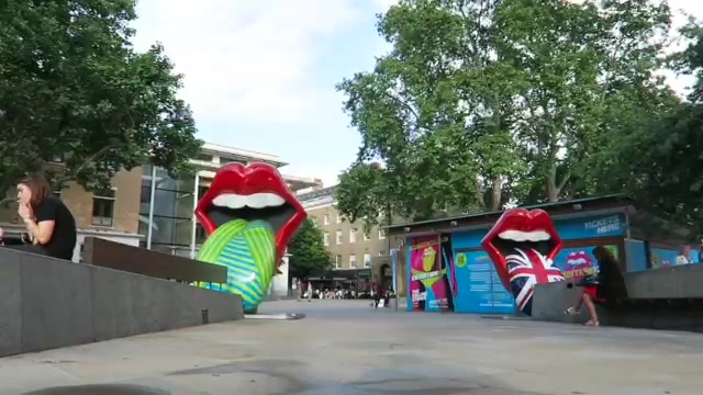 Colourful Rolling Stones tongue sculptures outside Exhibitionism at Duke of York Square