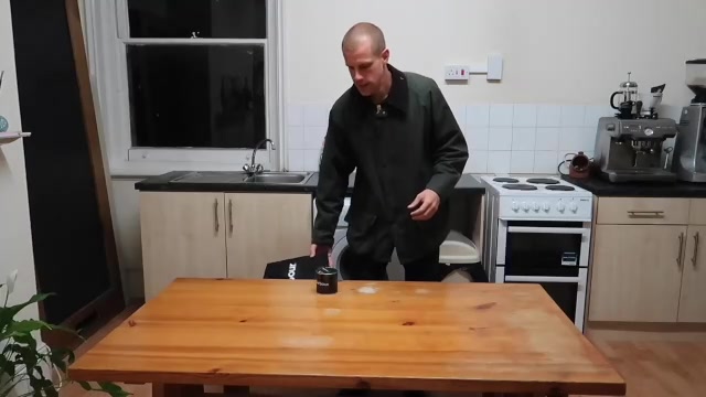 Barry preparing his Barbour jacket at home for re-waxing