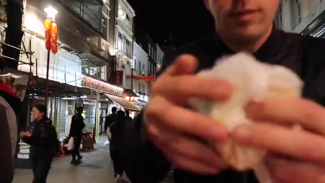 Unwrapping the pork bao from Baozi Inn