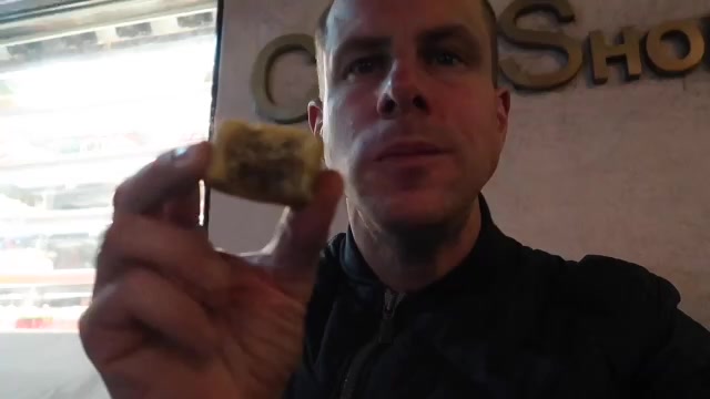 Trying a small mooncake outside Golden Gate Cake Shop