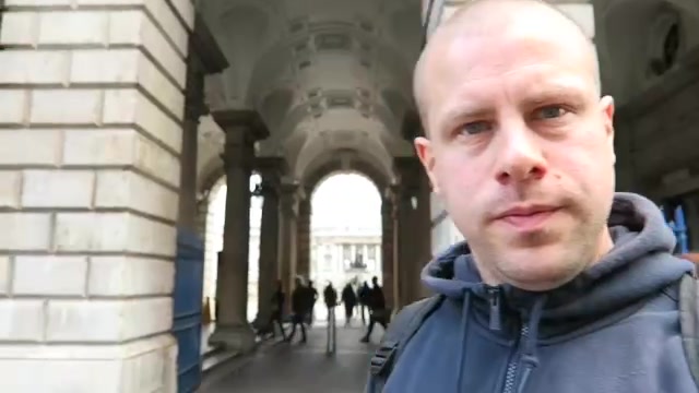 Robert beside the stone entrance to Somerset House during the Diwali day walk
