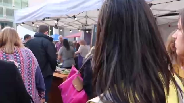 Food stalls and visitors behind the Royal Festival Hall