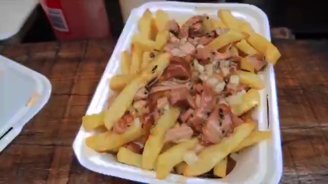 Chips topped with cheese and chicken gravy from Spit & Roast