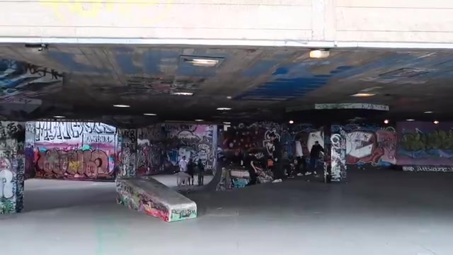 Skaters and colourful graffiti in the Southbank Centre undercroft
