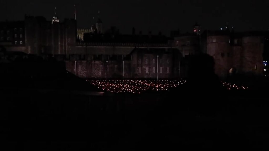 Flames illuminating the Tower of London moat for remembrance in 2018