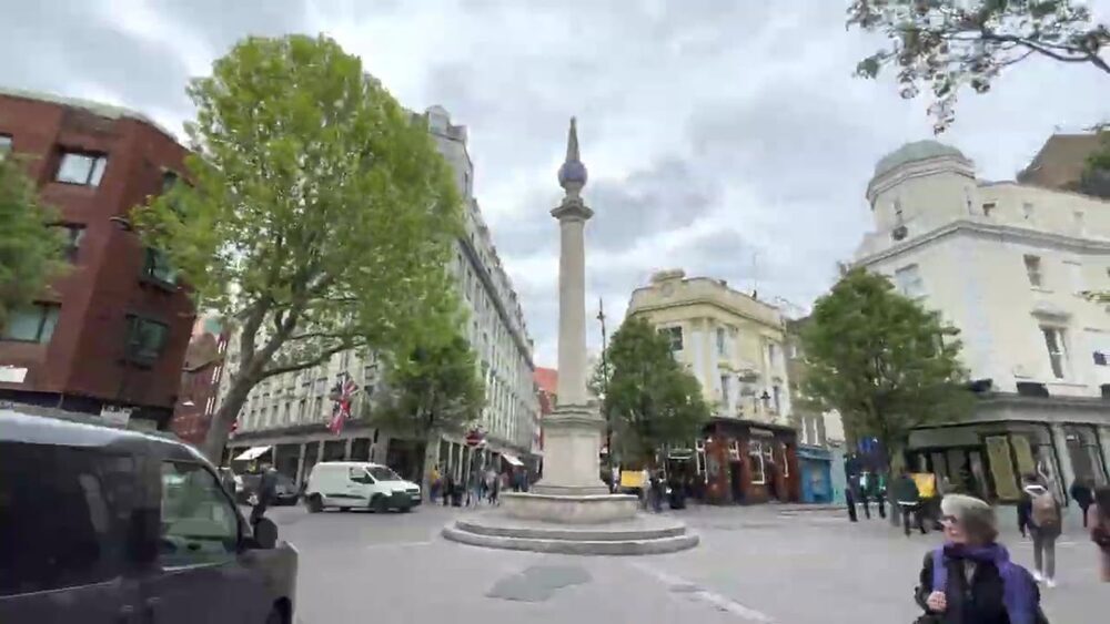 The Seven Dials sundial pillar and surrounding streets in London