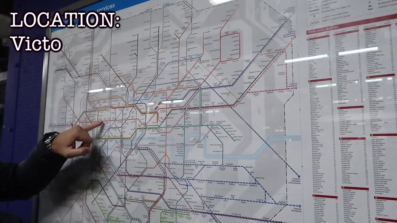 Barry pointing to an Underground map at Victoria station