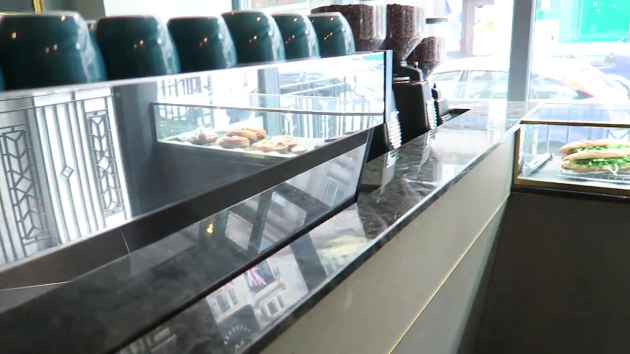 Coffee cups and pastries at the Workshop Coffee counter