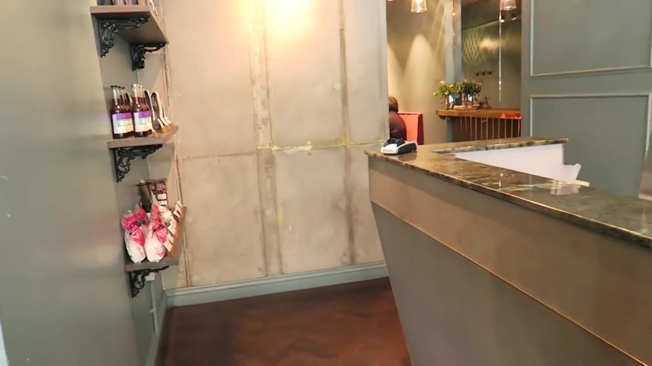 Counter and shelves inside the Fitzrovia branch of Workshop Coffee